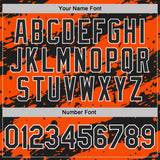 Custom Black Orange-White Paint Splash Stripe Performance Polo Shirt