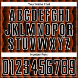 Custom Black Orange-White Geometric Shape Sublimation Soccer Uniform Jersey