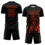 Custom Black Orange Splash Sublimation Soccer Uniform Jersey
